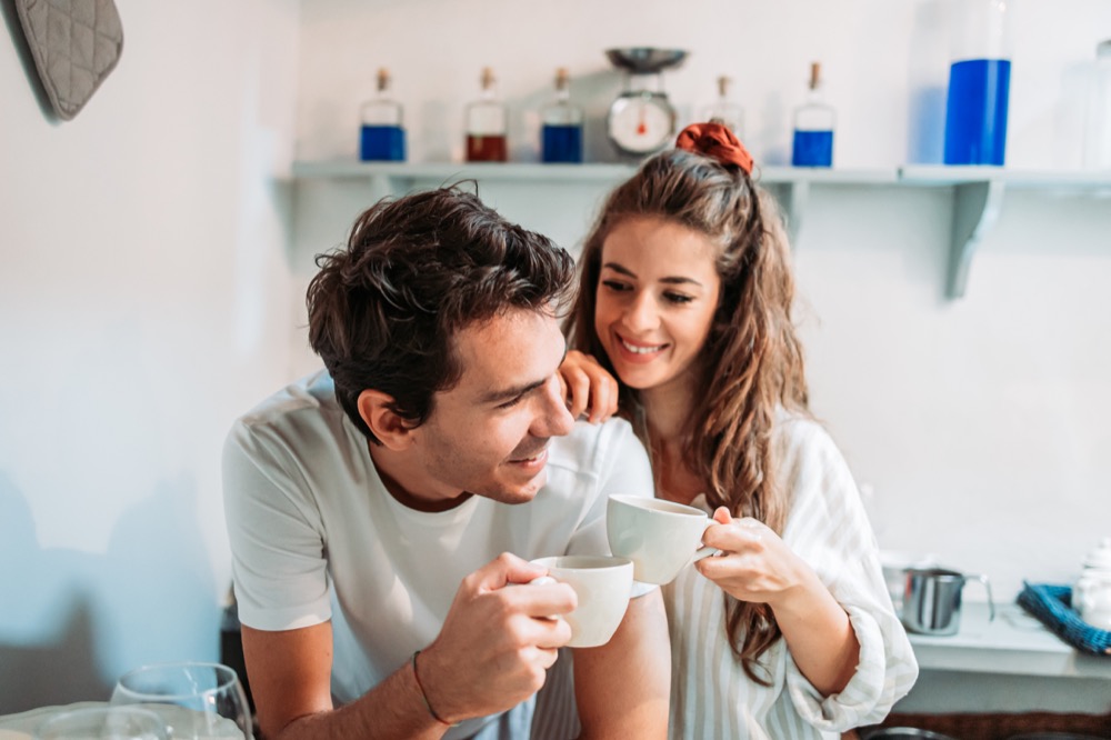 Young couple drinking a coffee in the morning